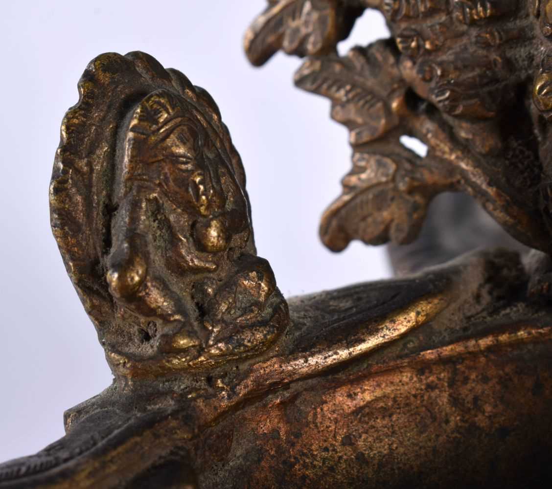 A RARE 18TH/19TH CENTURY TIBETAN NEPALESE BRONZE SUKUNDA LAMP the body decorated all over with - Image 6 of 10