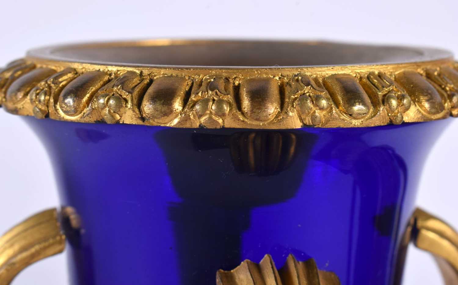 A LOVELY PAIR OF EARLY 19TH CENTURY FRENCH BLUE GLASS EMPIRE ORMOLU VASES modelled upon acanthus - Image 4 of 7