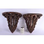 A VERY RARE PAIR OF 19TH CENTURY SCOTTISH POTTERY GROTTO WALL BRACKETS of naturalistic form,