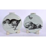 A RARE PAIR OF 19TH CENTURY AESTHETIC MOVEMENT POTTERY FLASKS decorated with chicks and ducks