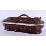 AN ANTIQUE CONTINENTAL POTTERY HARE TUREEN AND COVER. 28 cm wide.