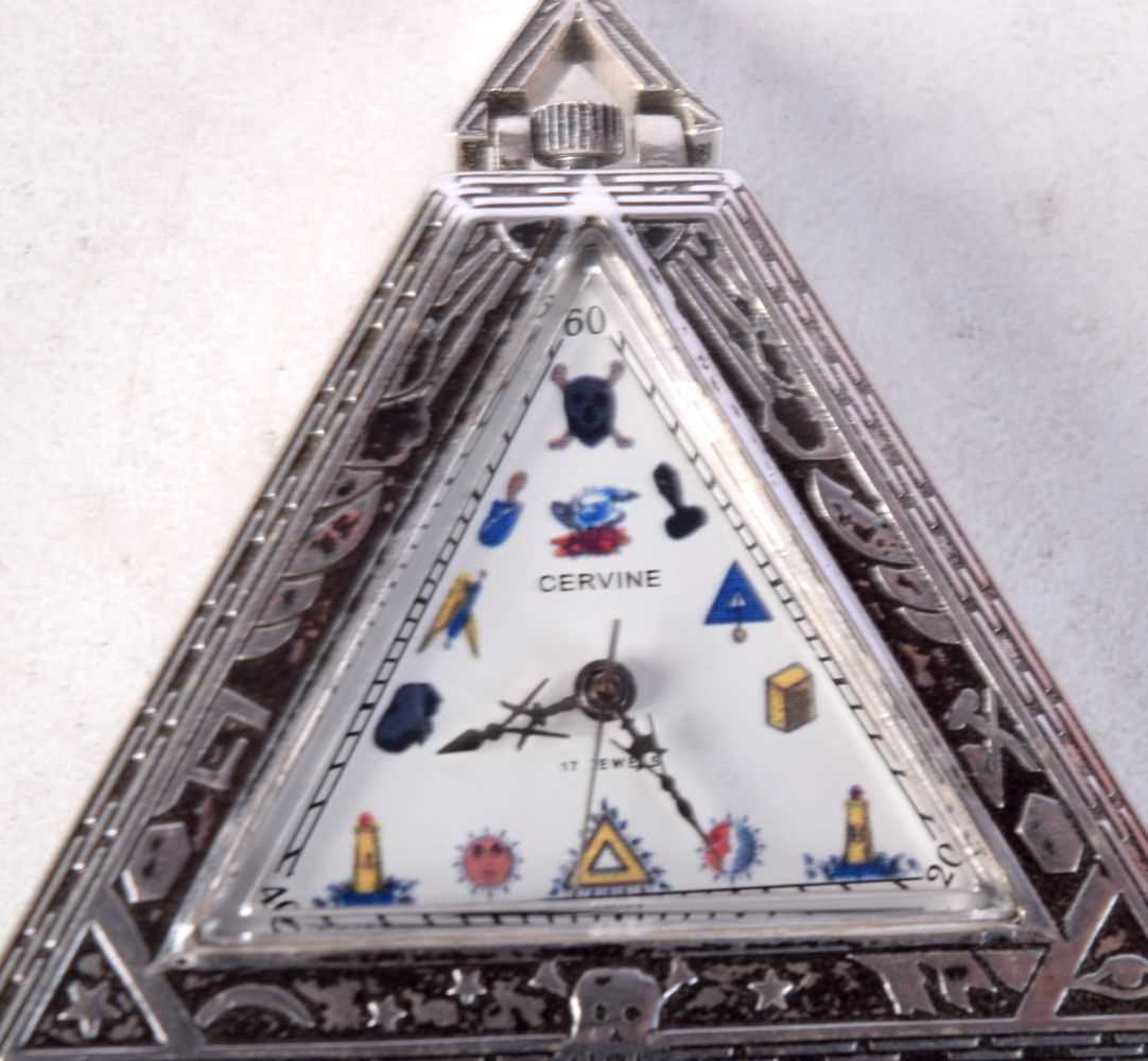 A TRIANGULAR MASONIC POCKET WATCH BY CERVING. Running, 5cm x 5.5cm