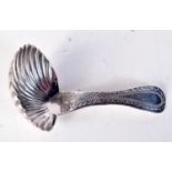 A SILVER CADDY SPOONS WITH SHELL FORM BOWLS BY MAURICE FREEMAN . Hallmarked London 1908. 7.5cm x 3.