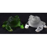 A PAIR OF FRENCH LALIQUE GLASS GREGOIRE TOADS modelled recumbent. 10 cm x 10 cm.