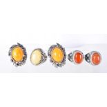 FIVE WHITE METAL FASHION RINGS SET WITH LARGE CABOCHONS. Sizes P/Q/R/W, total weight 45.1g (5)