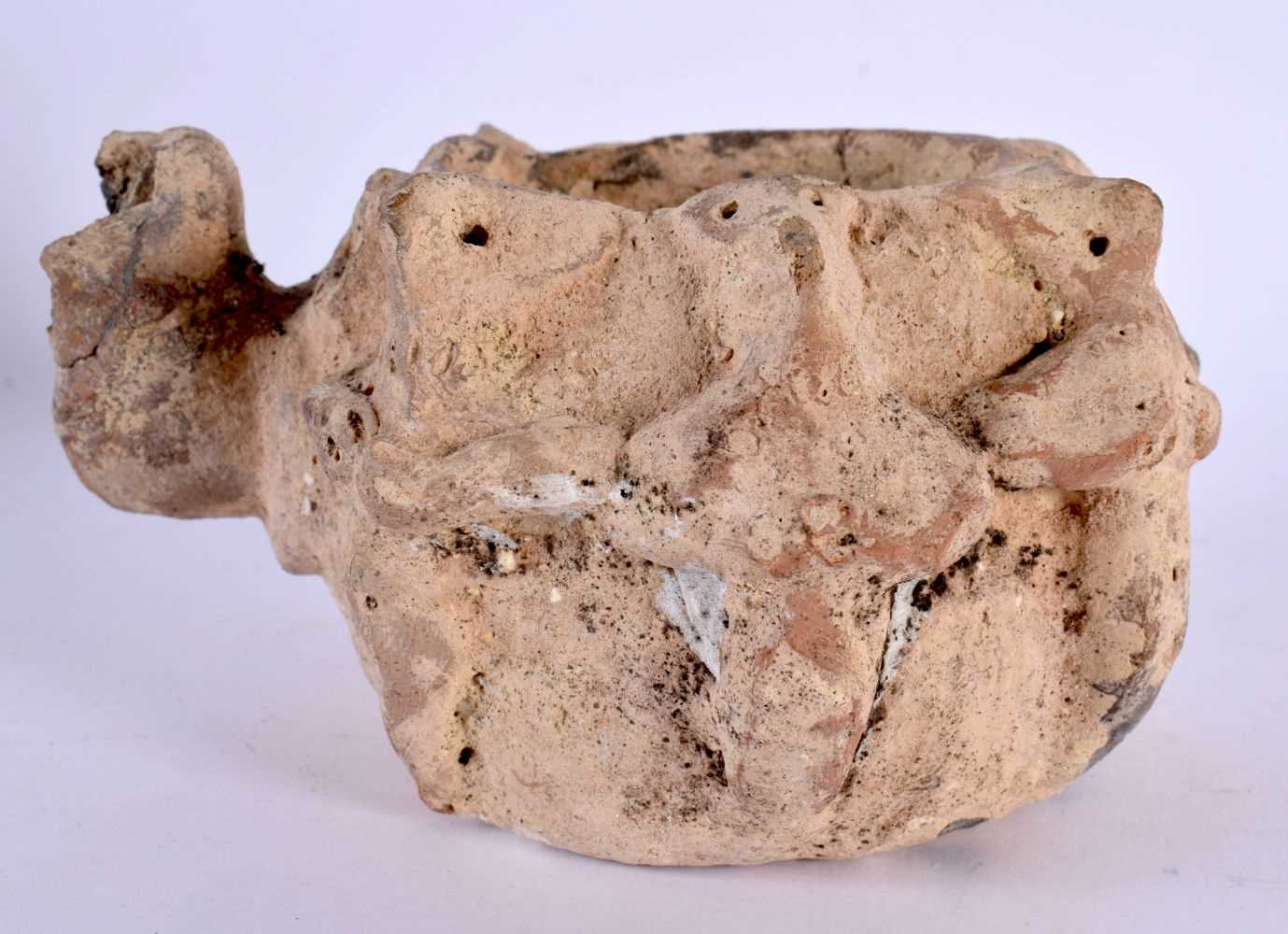 AN UNUSUAL EARLY CONTINENTAL TERRACOTTA OIL LAMP After the Antiquity, together with a carved early - Image 5 of 8