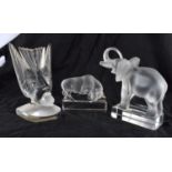 THREE FRENCH LALIQUE GLASS ANIMALS including a bird, elephant & bull. Largest 18 cm x 10 cm. (3)