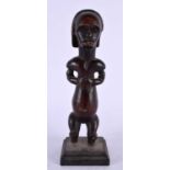 AN AFRICAN TRIBAL CARVED WOOD FANG FIGURE. 23 cm high.