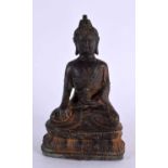 A 19TH CENTURY CHINESE TIBETAN BRONZE FIGURE OF A SEATED BUDDHA modelled upon a triangular base.