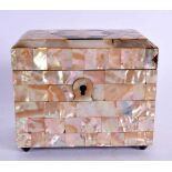 AN EARLY VICTORIAN MOTHER OF PEARL TEA CADDY of geometric form. 10 cm x 9 cm.