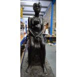 A VERY LARGE BRONZED PLASTER MAQUETTE SCULPTURE depicting an African female with child. 90cm x