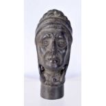 A BRONZE WALKING CAN TOP IN THE FORM OF A MOORS HEAD. 8.1cm x 5cm x 3.5cm, weight 160g