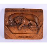 A 19TH CENTURY EUROPEAN LION OF LUCERNE GRAND TOUR TREEN WOOD PLAQUE with scripture to top. 16 cm