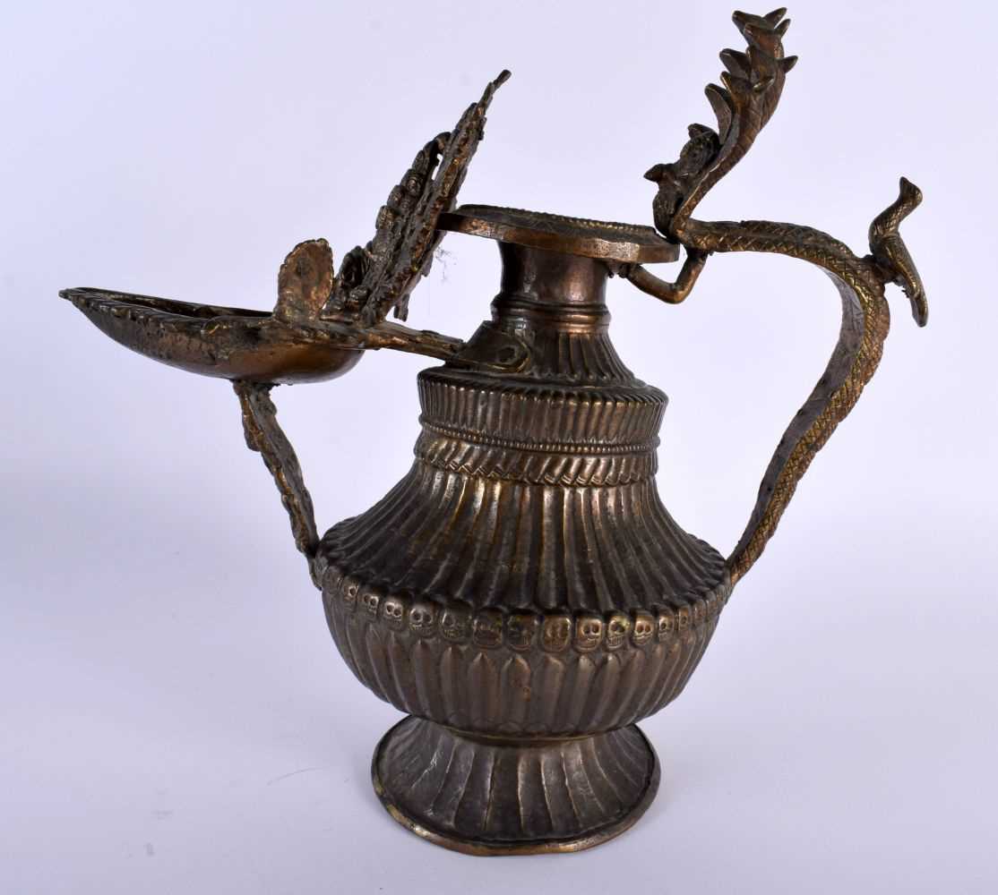 A RARE 18TH/19TH CENTURY TIBETAN NEPALESE BRONZE SUKUNDA LAMP the body decorated all over with - Image 7 of 10