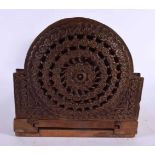 A 19TH CENTURY ANGLO INDIAN CARVED HARDWOOD SLIDING BOOK RACK. 56 cm x 15 cm extended.