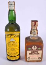 CUTTY SARK BLENDED SCOTS WHISKEY together with a White Heather 8 year old whiskey. (2)