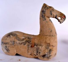 A Chinese Grey Pottery Horse with much of the original painted decoration under earth