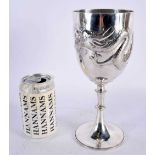 A LARGE 19TH CENTURY CHINESE EXPORT SILVER DRAGON GOBLET decorated in relief with a powerfully