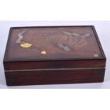 A 19TH CENTURY JAPANESE MEIJI PERIOD SILVER AND HARDWOOD RECTANGULAR BOX AND COVER in the manner