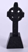 AN IRISH BOG OAK KILLARNEY CROSS decorated all over with shamrock. 59.2 grams. 12 cm x 6 cm. Note: