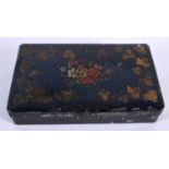 A SMALL ANTIQUE TOLEWARE RECTANGULAR BOX painted with flowers and vines. 11 cm x 7 cm.