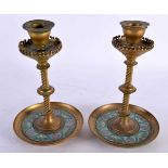A PAIR OF 19TH CENTURY FRENCH BRONZE AND CHAMPLEVE ENAMEL CANDLESTICKS with spiral formed central