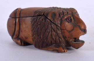 AN 18TH CENTURY FRENCH DUTCH FRUITWOOD CARVED WOOD SNUFF BOX modelled in the form of a recumbent