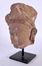 A 7th/8th Century Pink Sandstone Head of a Female Deity, Madhya Pradesh, Central India mounted on