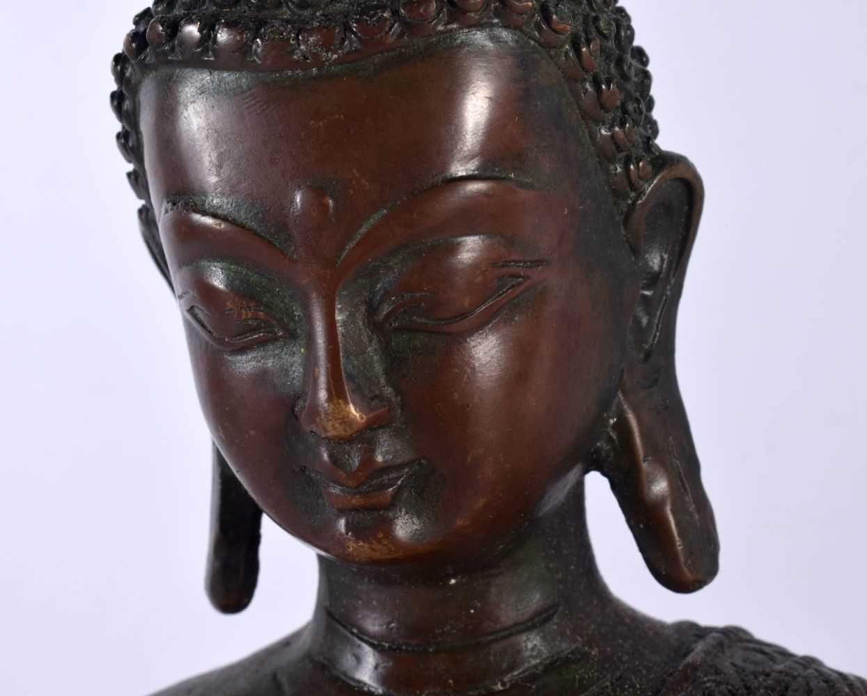 A LARGE CHINESE TIBETAN BRONZE FIGURE OF A BUDDHA 20th Century. 30cm x 16 cm. - Image 2 of 8