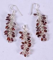 A PAIR OF SILVER MOUNTED GEMSTONE EARRINGS WITH A MATCHING PENDANT. Stamped 925, Pendant 4.5cm x 1.2