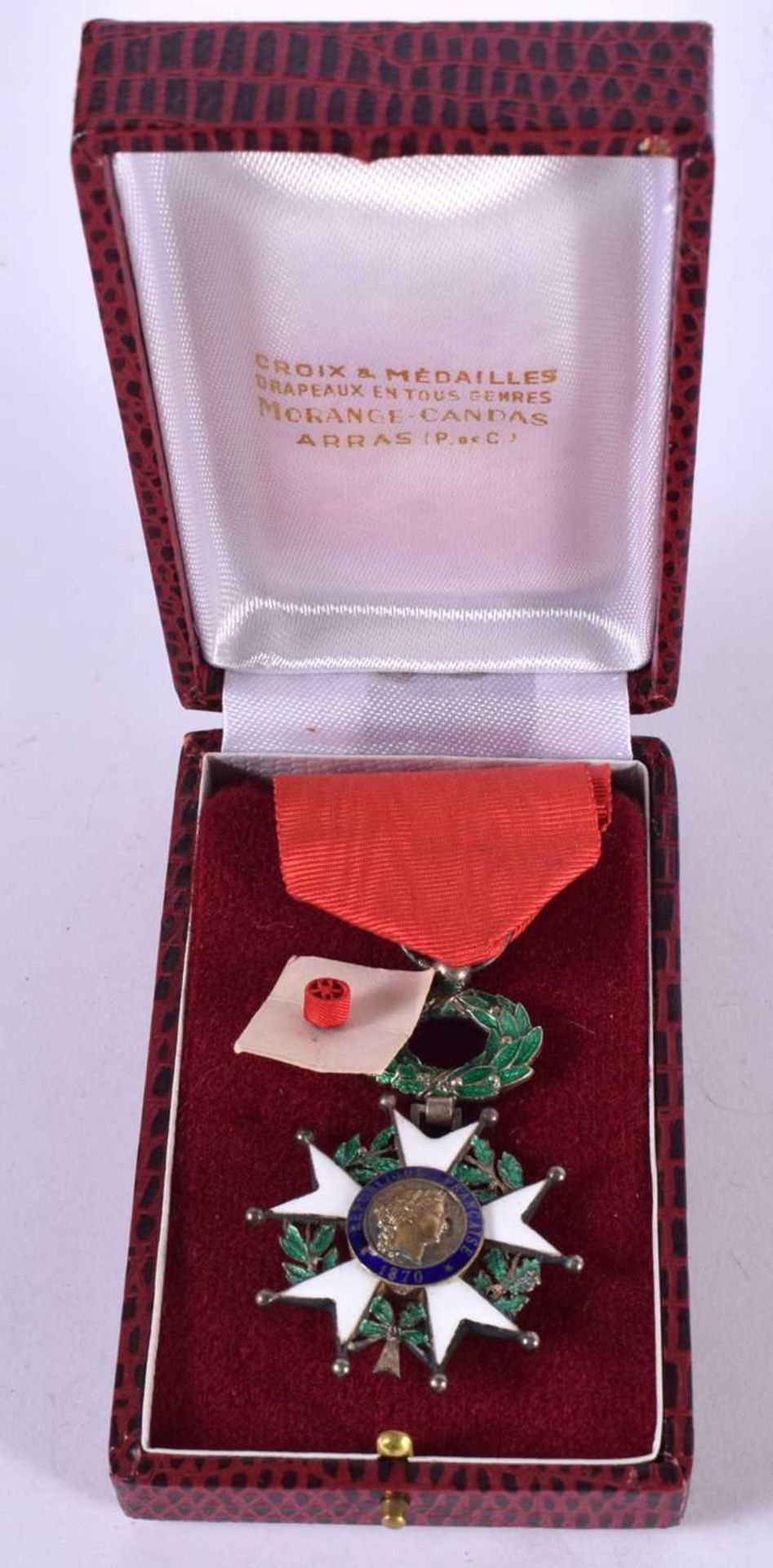 A CASED FRENCH LEGION OF HONOUR MEDAL "1870" WITH RIBBON