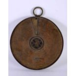 A 19TH CENTURY MIDDLE EASTERN ISLAMIC COPPER ALLOY ASTROLABE decorated all over with animals,