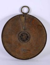 A 19TH CENTURY MIDDLE EASTERN ISLAMIC COPPER ALLOY ASTROLABE decorated all over with animals,