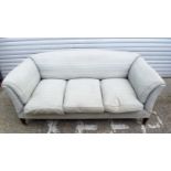An antique upholstered sofa 80 x 216 x 124 cm.