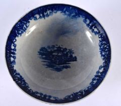 AN EARLY 19TH CENTURY ENGLISH FLOW BLUE PEARLWARE BOWL painted with landscapes. 22cm diameter.