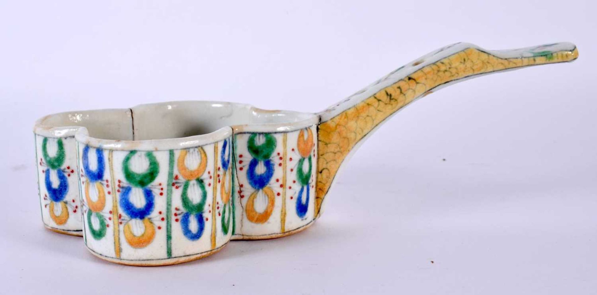 A MIDDLE EASTERN ARMENIAN FAIENCE SERVING BOWL painted with figures in landscapes. 22cm wide.