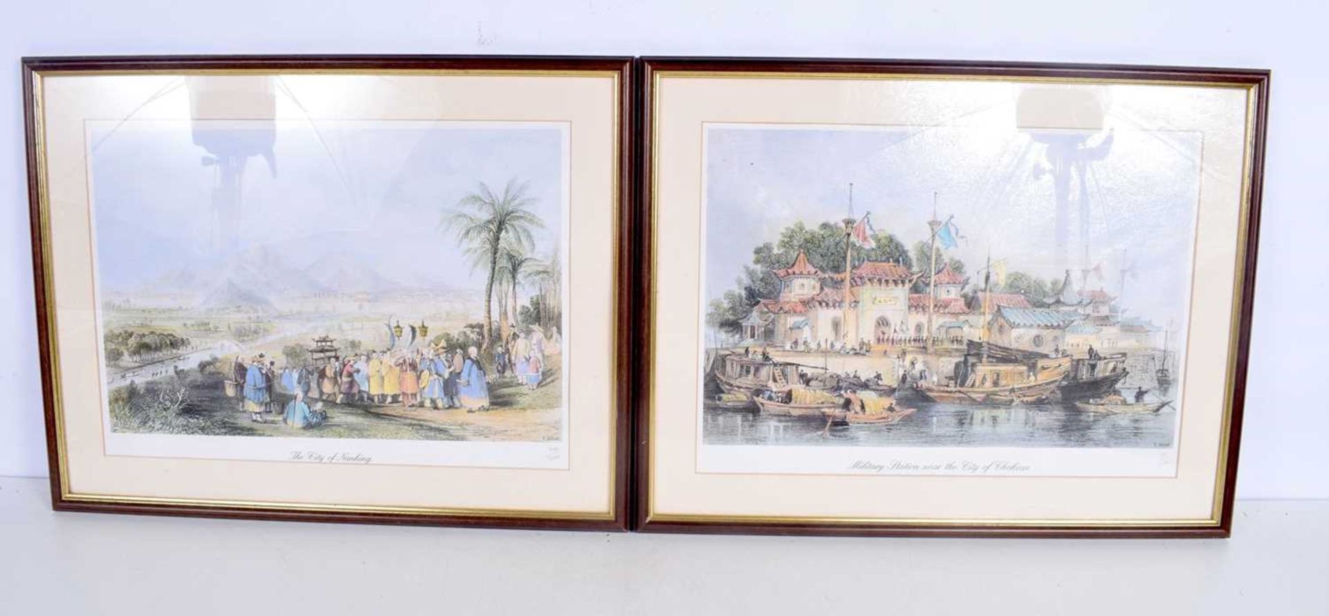 A pair of Framed limited edition prints by T Allom depicting Chinese Ports 27 x 38 cm. (2).