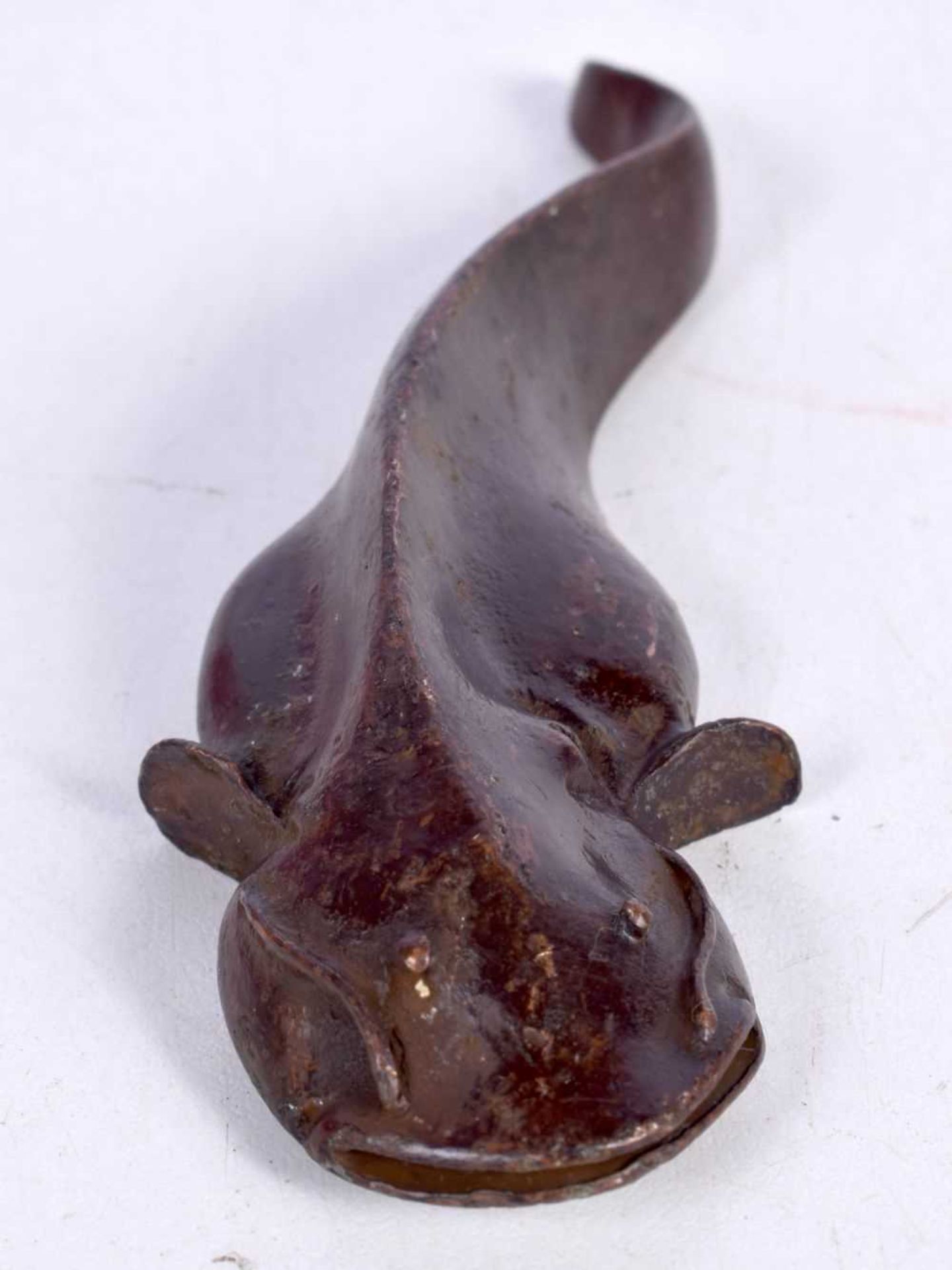 A BRONZE MODEL OF A CATFISH. 12.3cm x 4cm x 1.8 cm, weight 174g