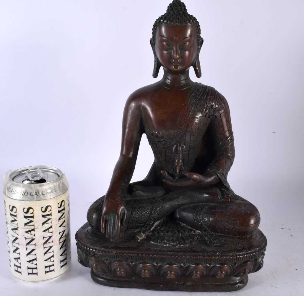 A LARGE CHINESE TIBETAN BRONZE FIGURE OF A BUDDHA 20th Century. 30cm x 16 cm.