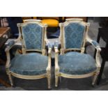 A pair of French Louis XVI style Fauteuil armchair with brass and bone castors 88 x 61 cm.
