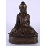 AN 18TH/19TH CENTURY INDIAN BRONZE FIGURE OF A BUDDHA modelled upon a triangular base. 17 cm x 10