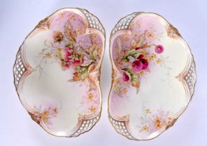 AN UNUSUAL PAIR OF ROYAL WORCESTER RETICULATED STRAWBERRY DISHES painted and gilded with fruiting