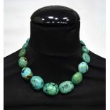 A Turquoise stone necklace together with a polished hardstone necklace largest 48 cm (2).