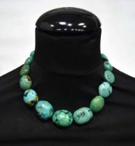 A Turquoise stone necklace together with a polished hardstone necklace largest 48 cm (2).