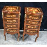 A pair of French style 4 drawer inlaid chests with gilt metal decoration 77 x 35 x 35 cm. (2).