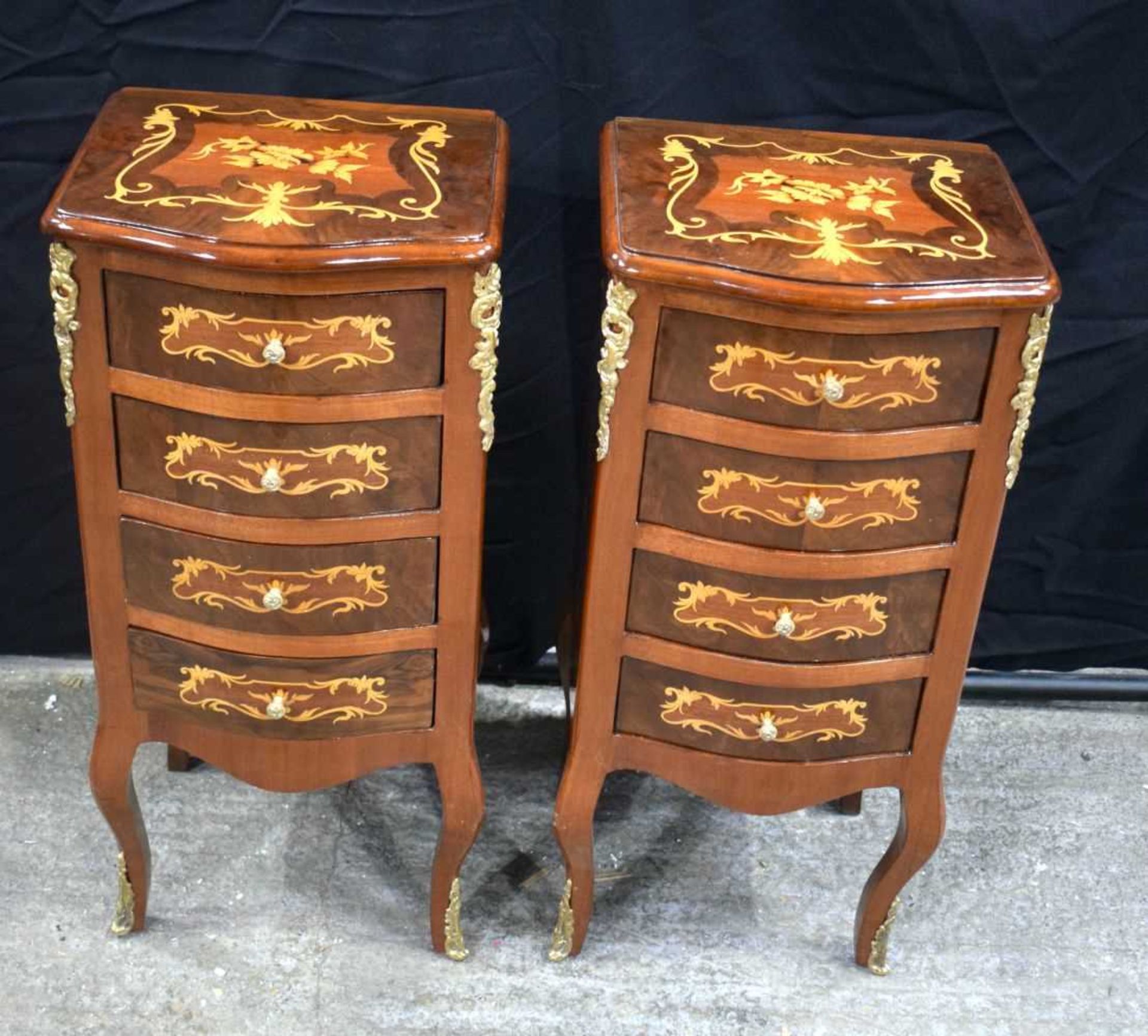 A pair of French style 4 drawer inlaid chests with gilt metal decoration 77 x 35 x 35 cm. (2).