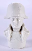 A SMALL ANTIQUE PORCELAIN BUST OF NAPOLEON. 6 cm x 3.5 cm.