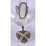 A SILVER RING SET WITH MOTHER OF PEARL TOGETHER WITH A HEART SHAPED LOCKET PENDANT. Both Stamped