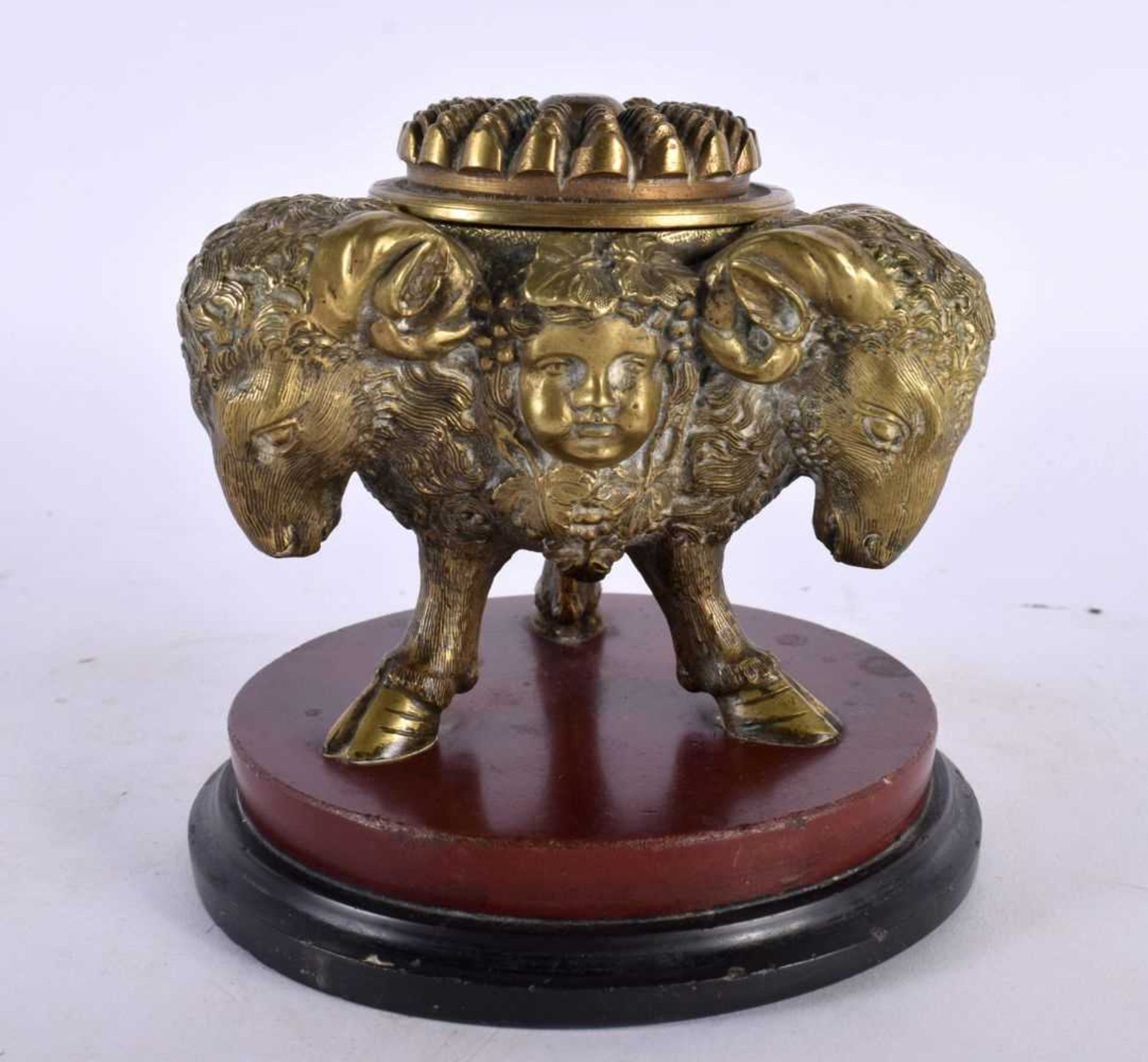 A FINE 19TH CENTURY EUROPEAN GRAND TOUR BRONZE INKWELL AND COVER upon a red marble base, formed with