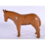 A VINTAGE CARVED FOLK ART PAINTED NAIVE FIGURE OF A HORSE. 27 cm x 14cm.